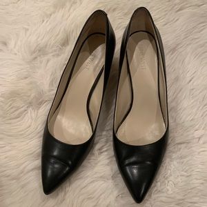 Nine West black leather pumps